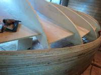 The staircase hull is built on CNC cut forms that were assembled to function as a bending form